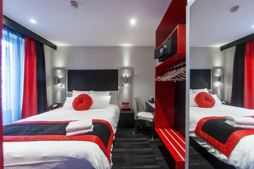 Postel nebo postele na pokoji v ubytování Hôtel Boutique Richelieu, Lyon Gare Part-Dieu