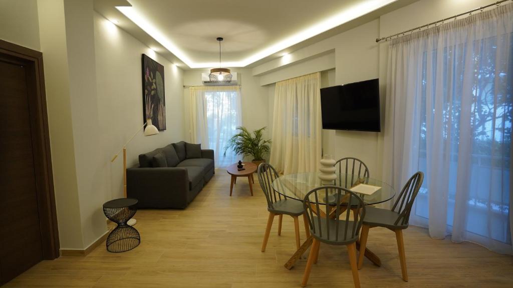 Televízia a/alebo spoločenská miestnosť v ubytovaní Ventiri Family Suite 1