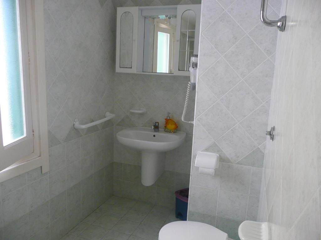 Koupelna v ubytování I Papiri B&B Aparthotel