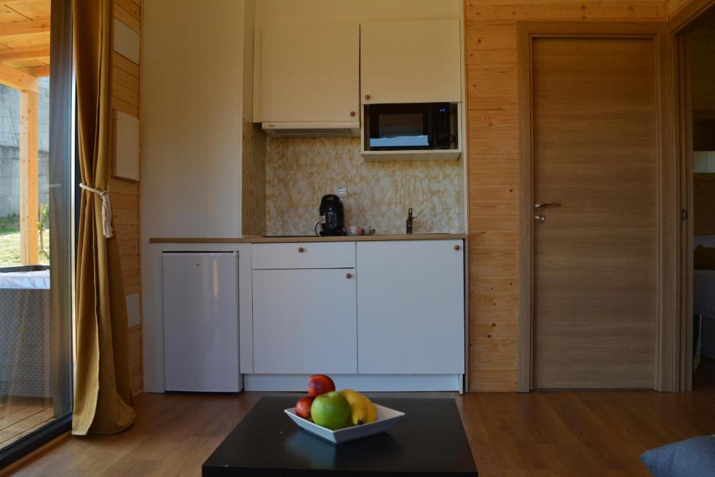 Kuchyňa alebo kuchynka v ubytovaní Cabañas Compostela - Cabaña Bosque Encantado