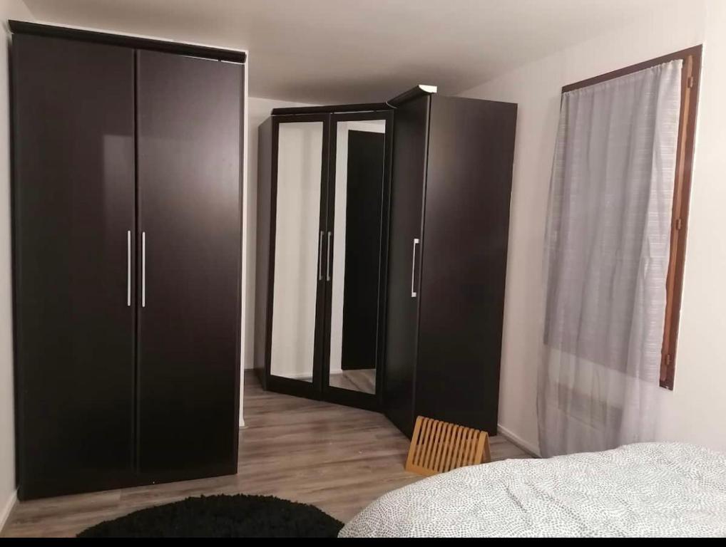 Ένα ή περισσότερα κρεβάτια σε δωμάτιο στο Hyper centre - Proche airbus - Tout confort - Magnifique terrasse