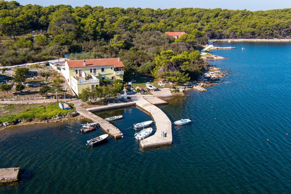 an aerial view of a harbor with boats in the water at Apartments by the sea Veli Rat, Dugi otok - 438 in Veli Rat