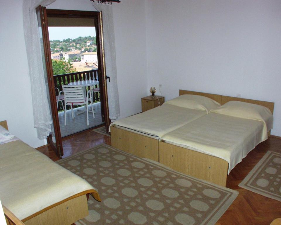 Postel nebo postele na pokoji v ubytování Apartments by the sea Sali, Dugi otok - 454