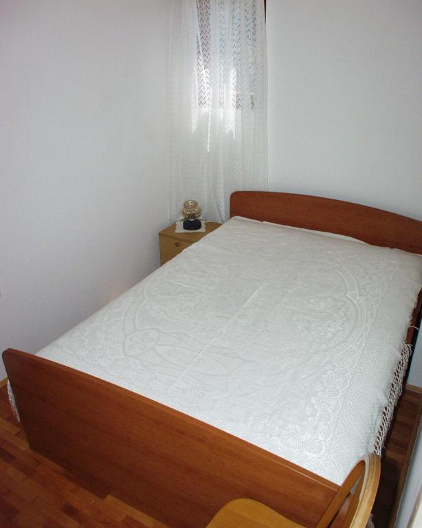 Postel nebo postele na pokoji v ubytování Apartments by the sea Sali, Dugi otok - 454