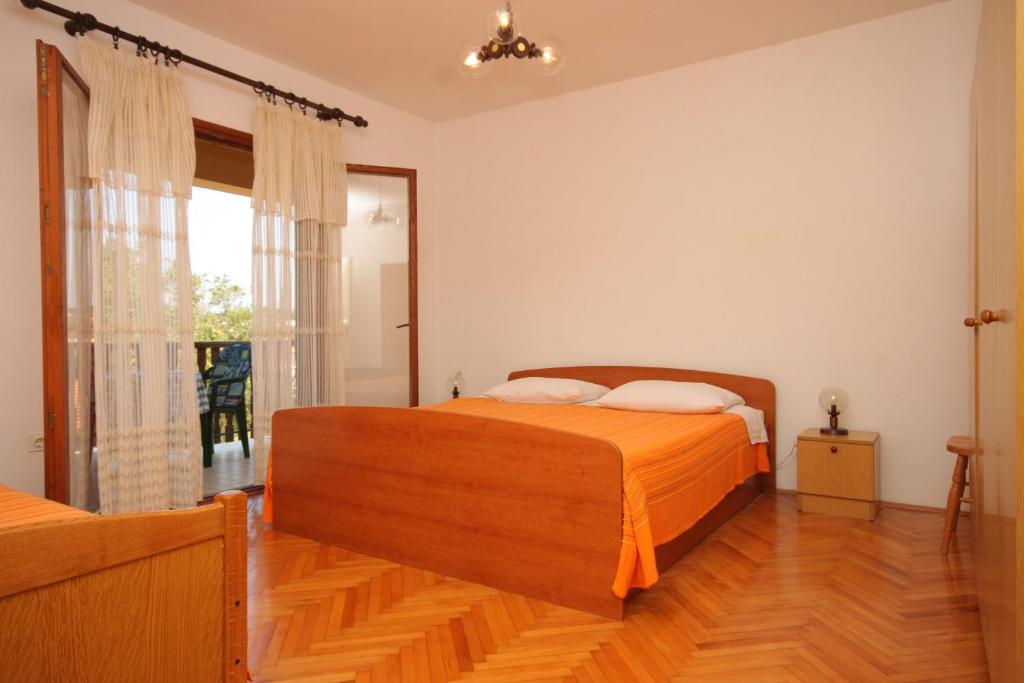 Postel nebo postele na pokoji v ubytování Apartments by the sea Sali, Dugi otok - 454