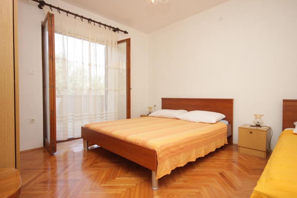 Postel nebo postele na pokoji v ubytování Apartments by the sea Sali, Dugi otok - 454