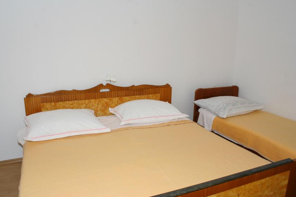 Posteľ alebo postele v izbe v ubytovaní Apartment Podgora 518d