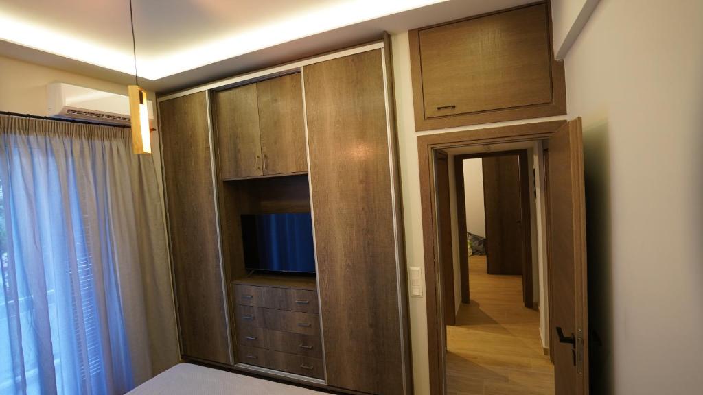 Televízia a/alebo spoločenská miestnosť v ubytovaní Ventiri Family Suite 1
