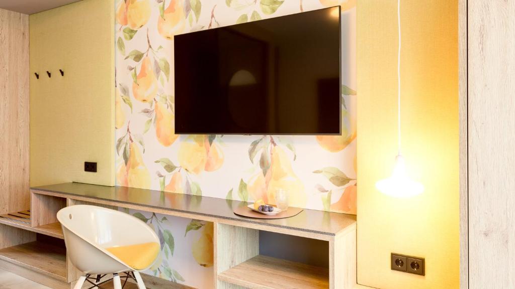 TV a/nebo společenská místnost v ubytování Obstgarten Gästehaus