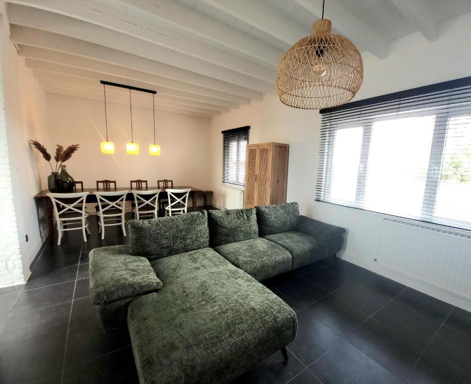 Posezení v ubytování vakantiewoning Paradisus