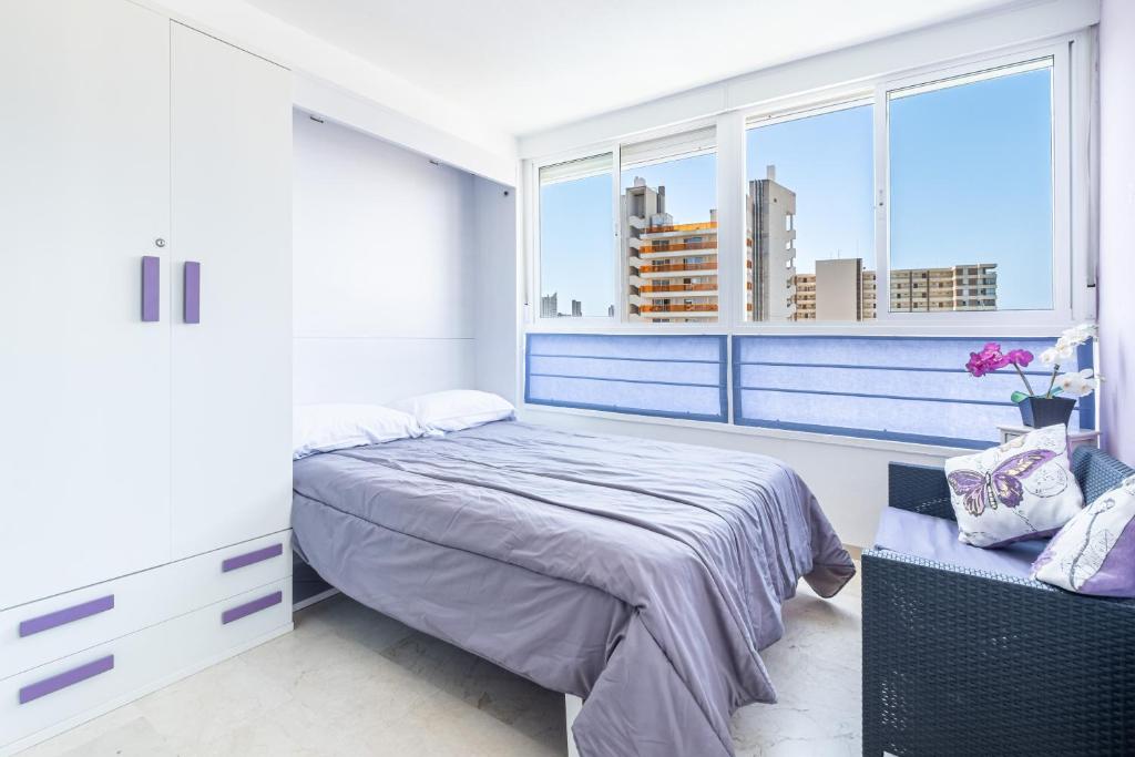 Postel nebo postele na pokoji v ubytování Gemelos 22 Resort Apartment 2-15-B Levante Beach