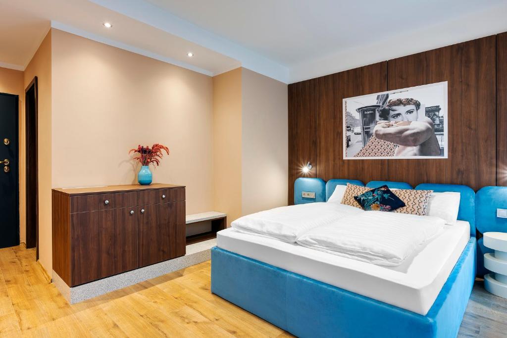 Postel nebo postele na pokoji v ubytování SWU Magazine Rooms