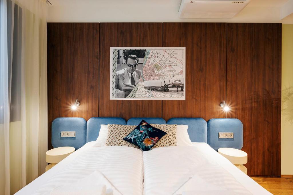 Postel nebo postele na pokoji v ubytování SWU Magazine Rooms