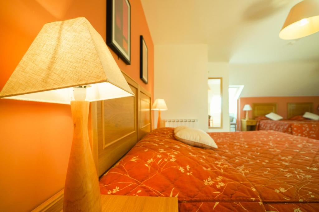 Postel nebo postele na pokoji v ubytování Inch Beach House B&B