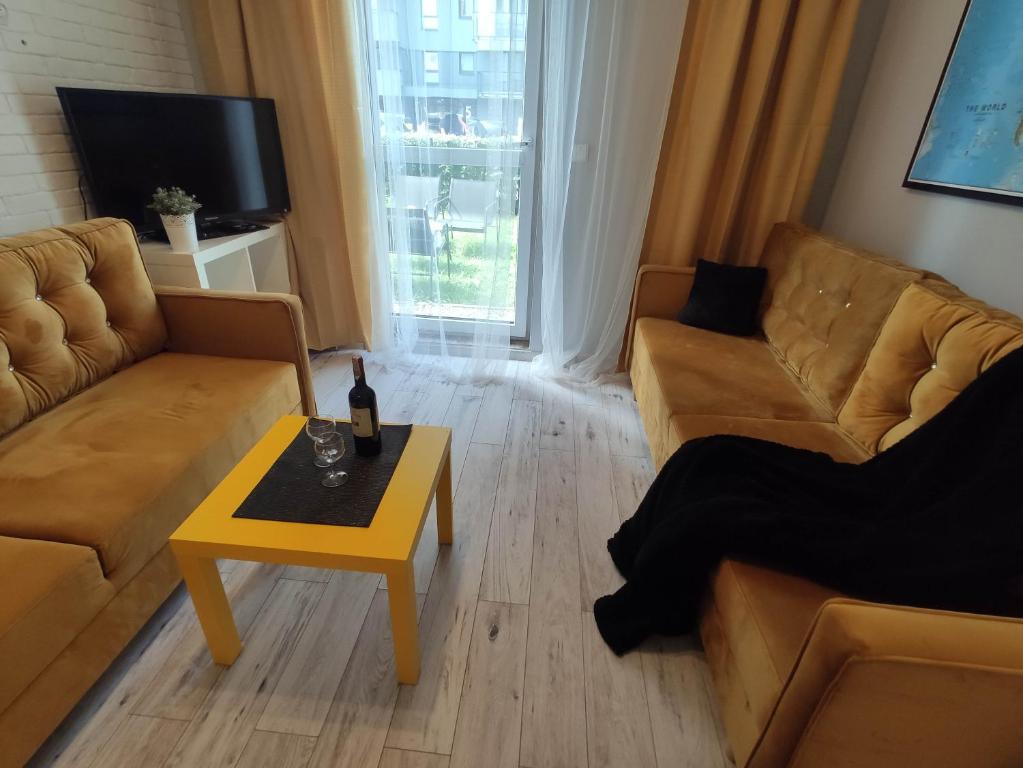 Televízia a/alebo spoločenská miestnosť v ubytovaní Black House