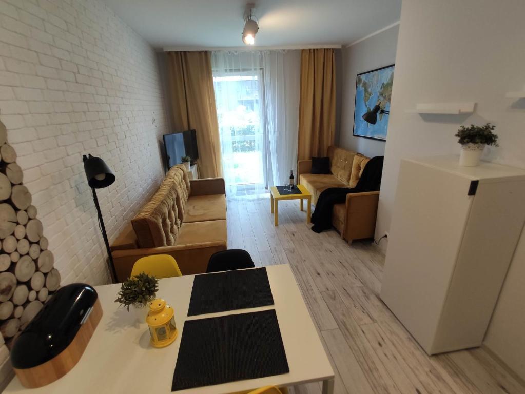 Televízia a/alebo spoločenská miestnosť v ubytovaní Black House