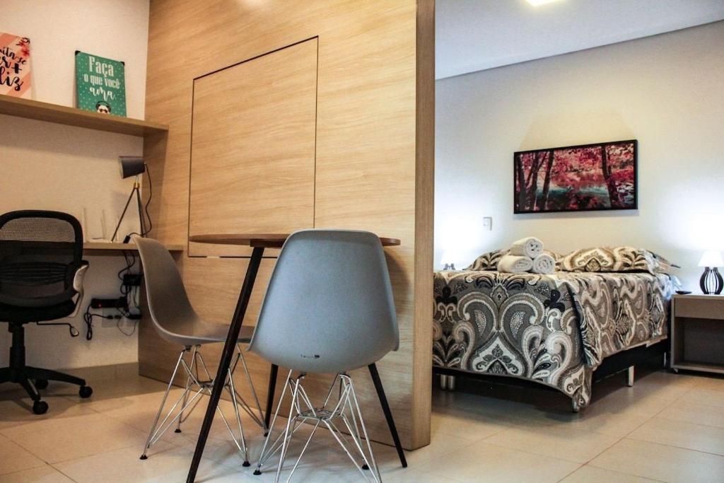 Ένα ή περισσότερα κρεβάτια σε δωμάτιο στο Studio 408 self-check in wifi Nova Aliança