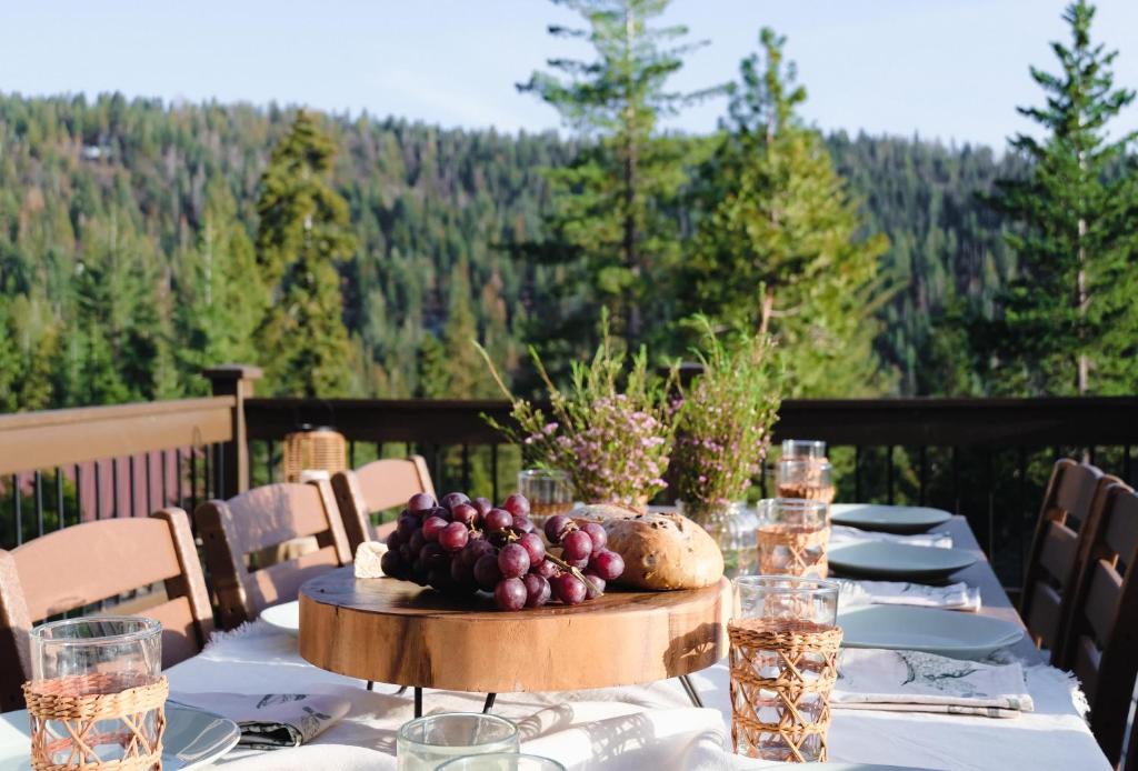 a table with a bowl of fruit on top of it at Yosemite Summit & Little Summit in Yosemite West