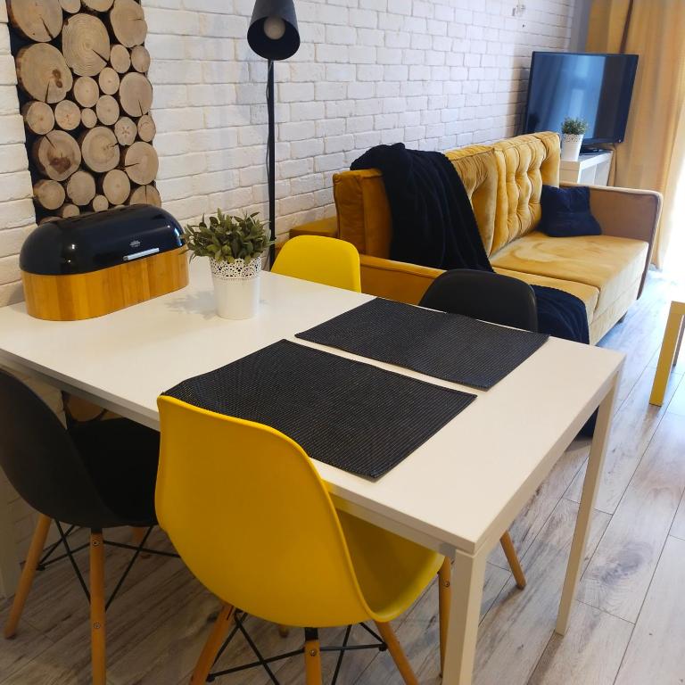 Televízia a/alebo spoločenská miestnosť v ubytovaní Black House