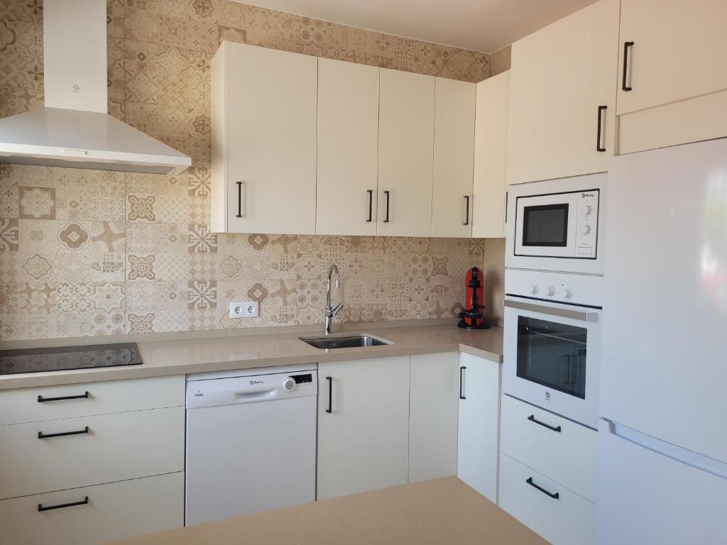 Kuchyň nebo kuchyňský kout v ubytování CASA CLEMEN