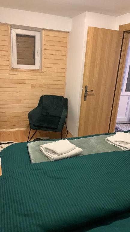 Letto o letti in una camera di Apartments CENTER OF THE WORLD