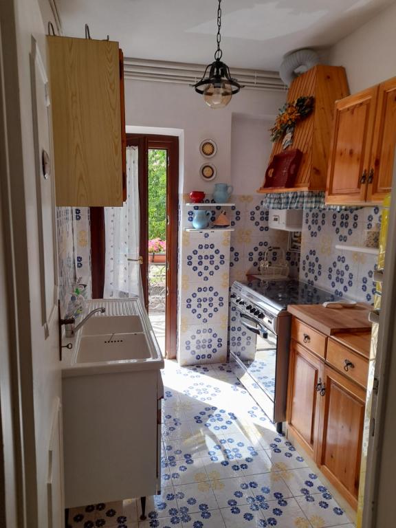 Kuchyň nebo kuchyňský kout v ubytování Casa vacanze Daniela