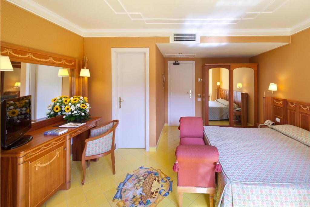 Postel nebo postele na pokoji v ubytování Grand Hotel La Pace - All Inclusive