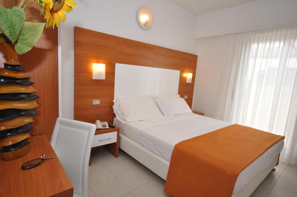 Postel nebo postele na pokoji v ubytování Hotel Adriatic&Beauty