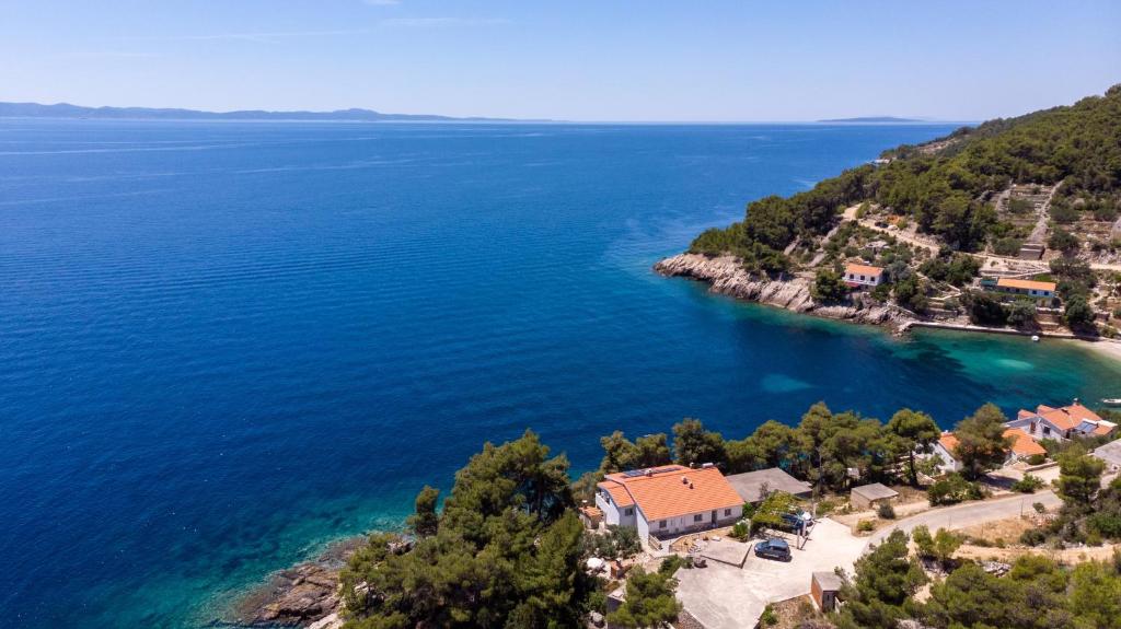 an aerial view of a small island in the ocean at Seaside secluded apartments Cove Torac, Hvar - 575 in Gdinj