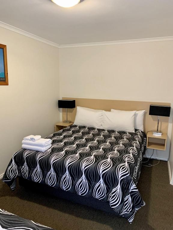 Postel nebo postele na pokoji v ubytování Seahorse Motel Cowes
