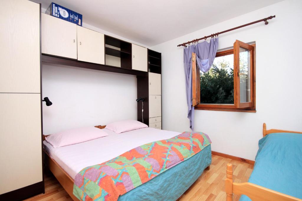 Posteľ alebo postele v izbe v ubytovaní Apartments by the sea Brna, Korcula - 560
