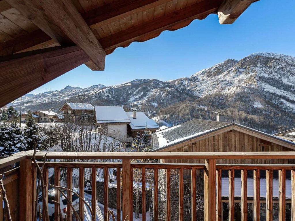 a view from the deck of a cabin with snow covered mountains at Chalet Saint-Martin-de-Belleville, 4 pièces, 8 personnes - FR-1-570-17 in Saint-Marcel