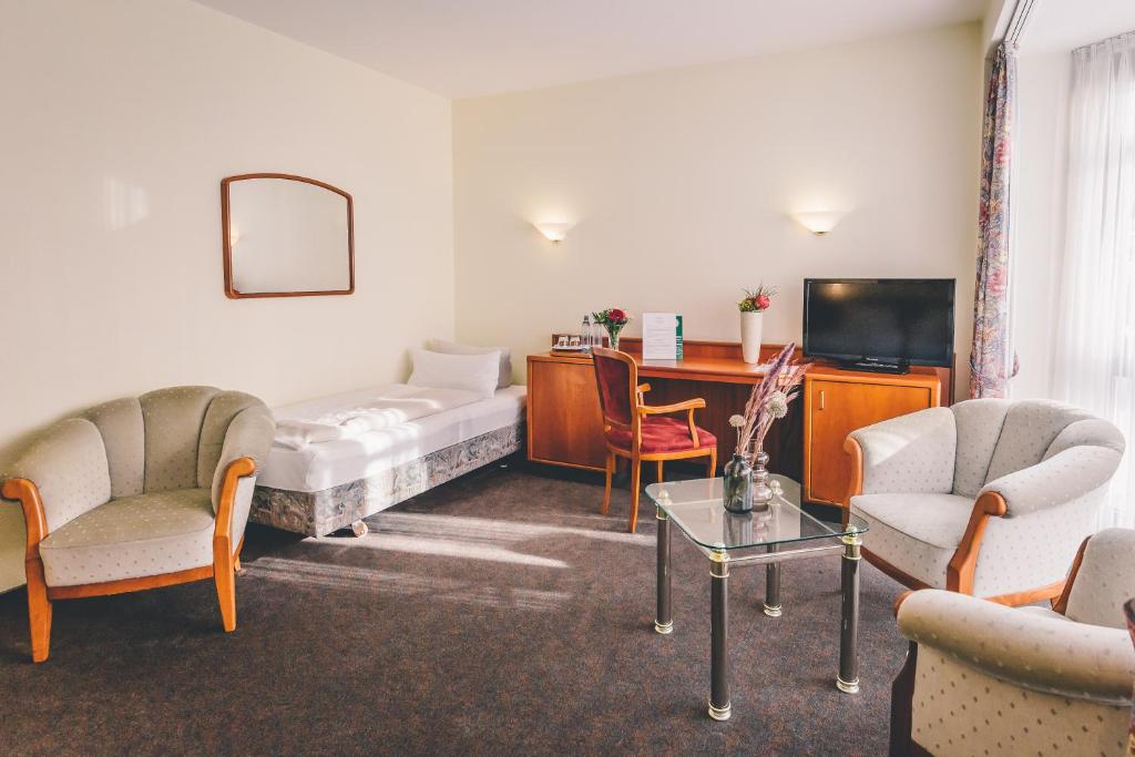 TV a/nebo společenská místnost v ubytování Hotel Gasthaus Appel Krug