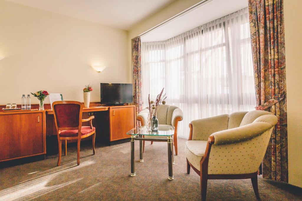 TV a/nebo společenská místnost v ubytování Hotel Gasthaus Appel Krug