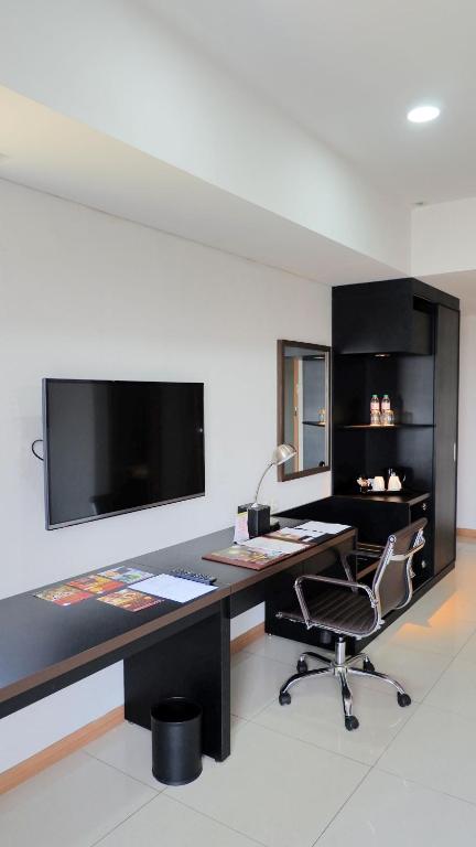 TV a/nebo společenská místnost v ubytování Sakura Park Hotel & Residence