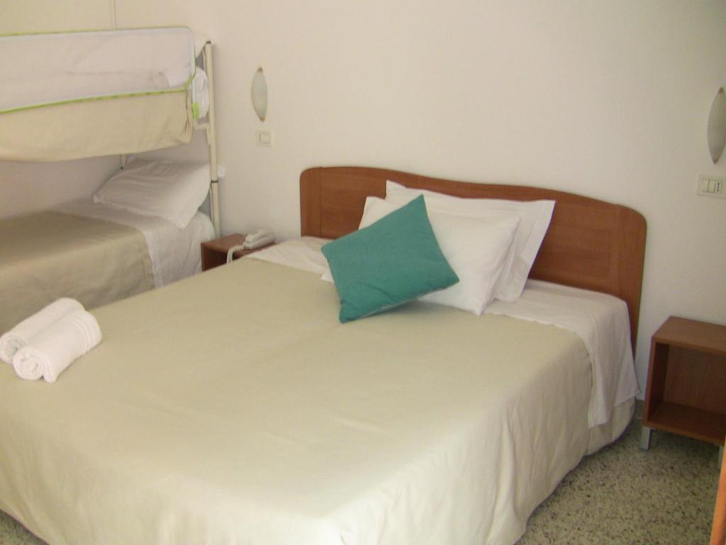 Posteľ alebo postele v izbe v ubytovaní Sportur Club Hotel