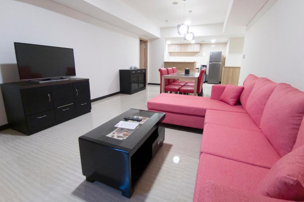 TV a/nebo společenská místnost v ubytování Sakura Park Hotel & Residence