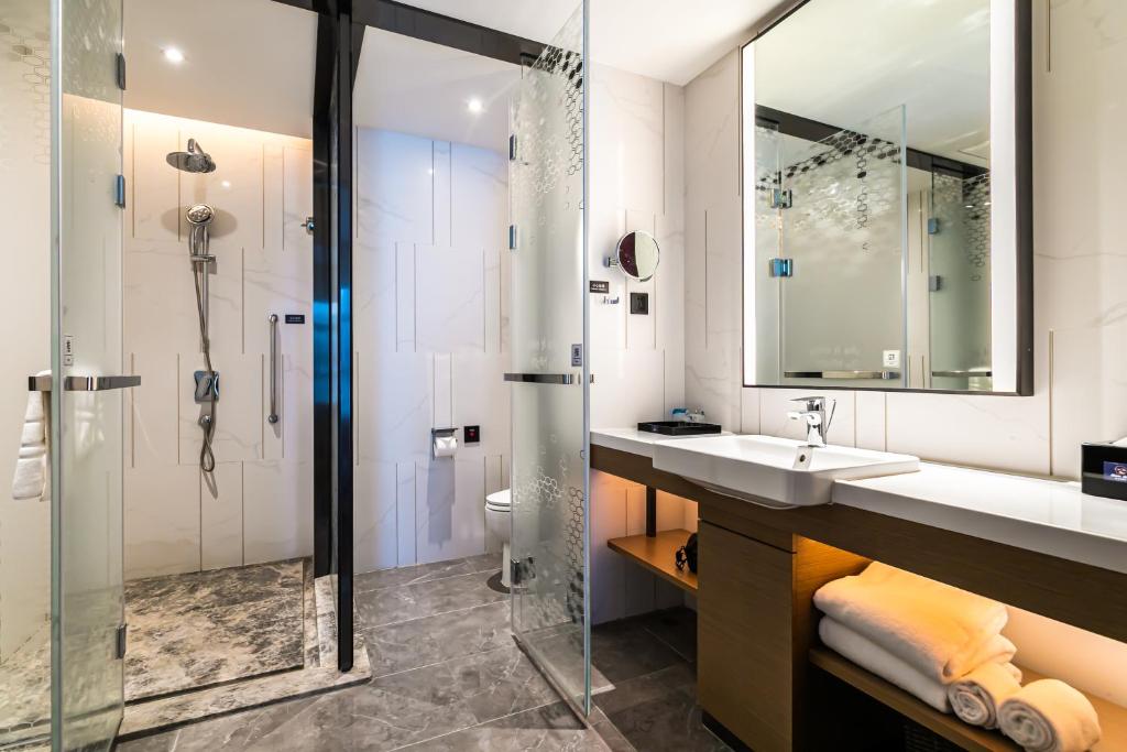Koupelna v ubytování 佛山敏卓酒店Mentor Hotel