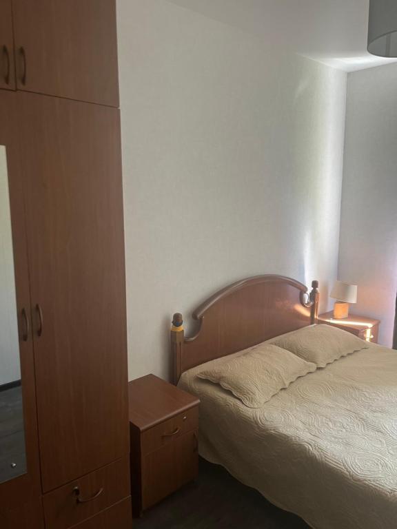 Postel nebo postele na pokoji v ubytování Cozy space in Tbilisi
