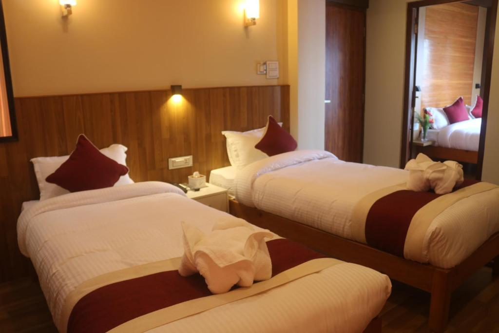Hotel Family Ties Pvt. Ltd. - Habitación Cuádruple Con Balcón