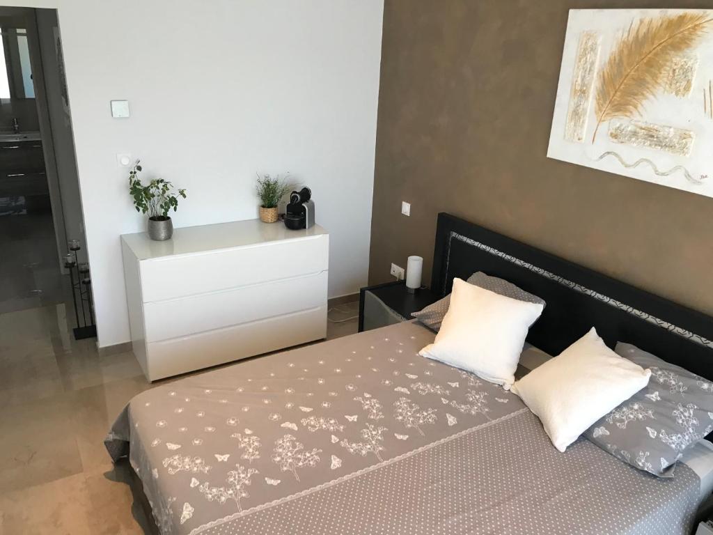Postel nebo postele na pokoji v ubytování Maison LILOMEL