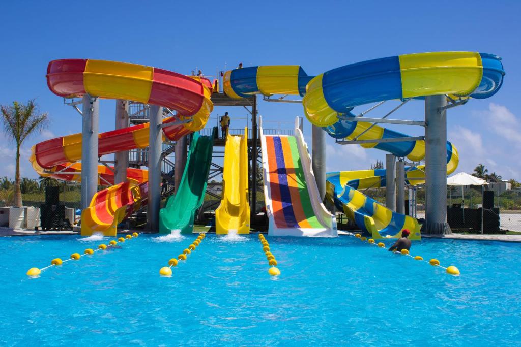 a water park with a colorful water slide at Maritim Crystals Beach Hotel Mauritius in Belle Mare