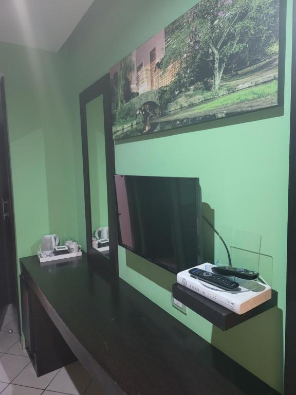 TV a/nebo společenská místnost v ubytování Sorrento Relais