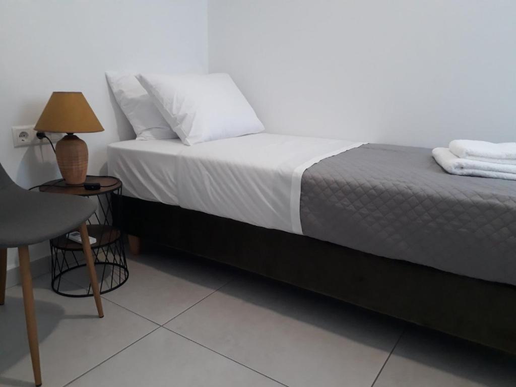 Postel nebo postele na pokoji v ubytování Κύκνος