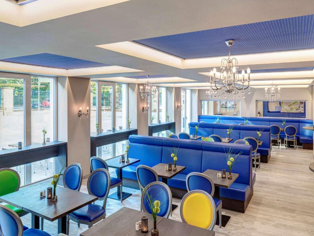 Ein Sitzbereich in der Unterkunft ibis Styles Rastatt Baden-Baden