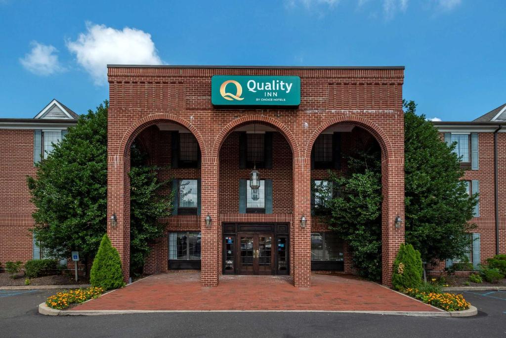 a brick building with a university sign on it at Quality Inn Montgomeryville-Philadelphia in Montgomeryville