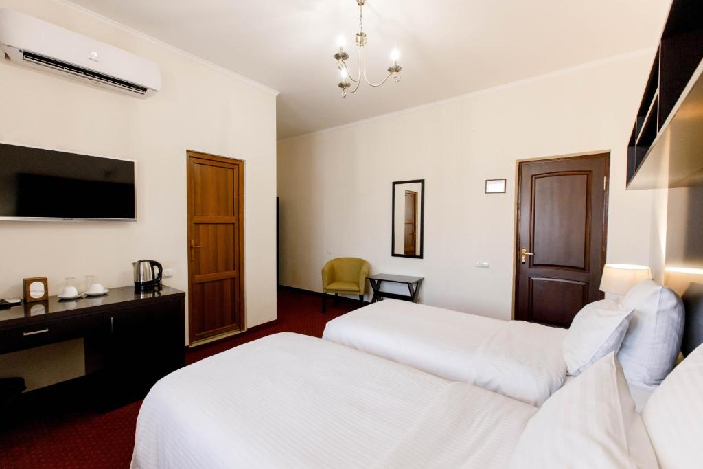 TV a/nebo společenská místnost v ubytování 14 Floor Hotel