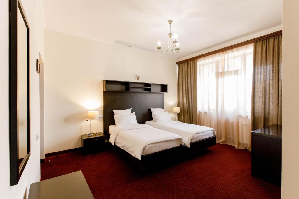 Postel nebo postele na pokoji v ubytování 14 Floor Hotel