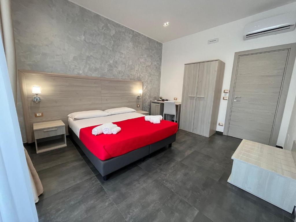 Postel nebo postele na pokoji v ubytování B&B Margherita