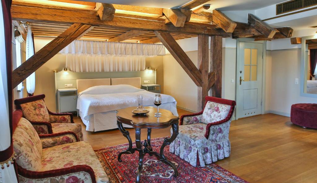 Voodi või voodid majutusasutuse Antonius Hotel toas